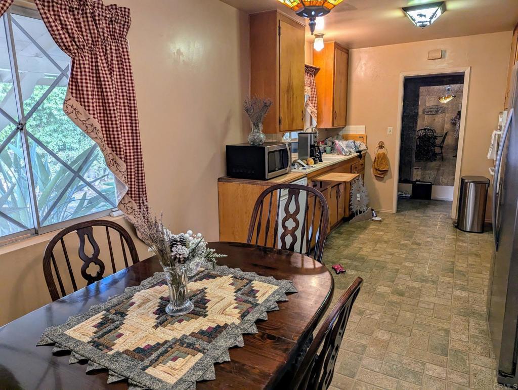 10309 Challenge Boulevard La Mesa, CA 91941 - Photo 20 of 51 a living room with furniture rug and a table