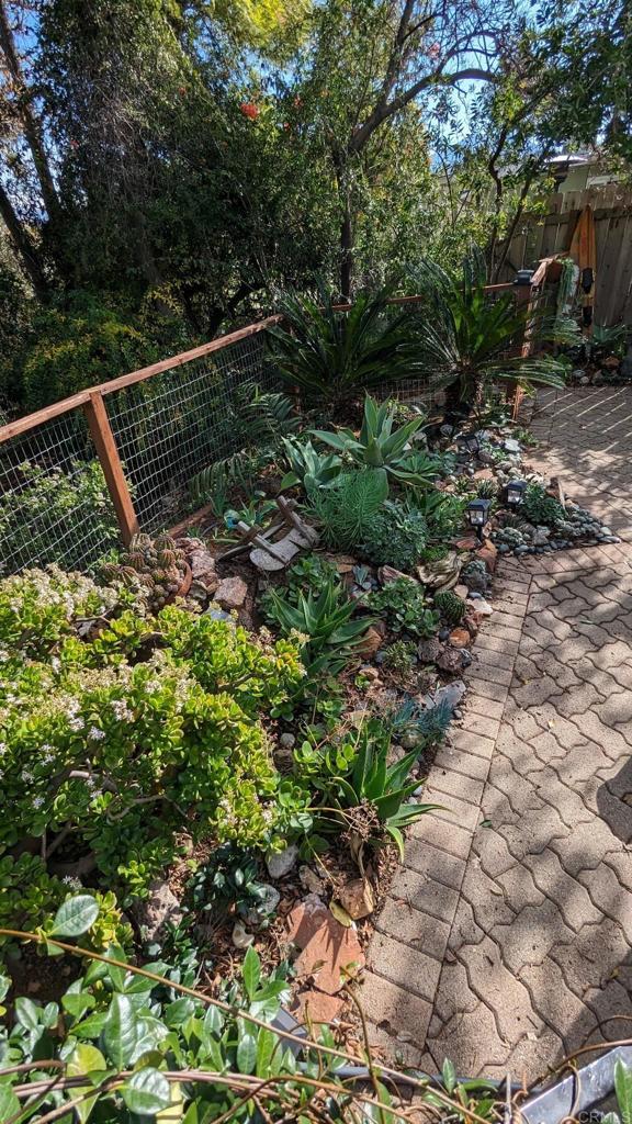 10309 Challenge Boulevard La Mesa, CA 91941 - Photo 48 of 51 a backyard of a house with lots of green space