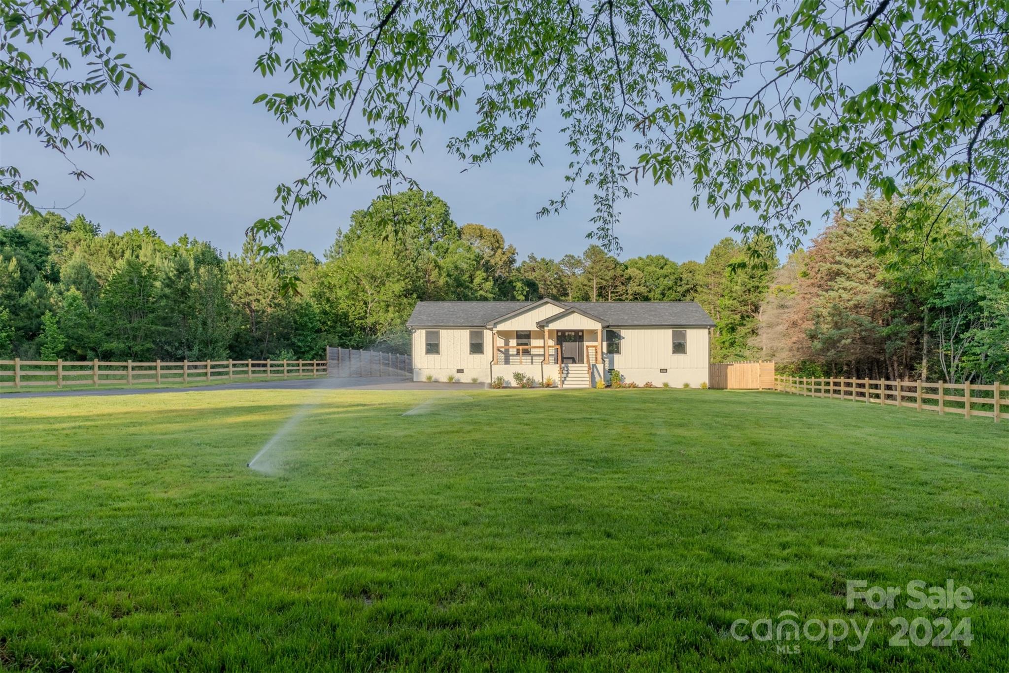 201 Potter Road Monroe, NC 28110 - Photo 2 of 44 a view of a house with a yard