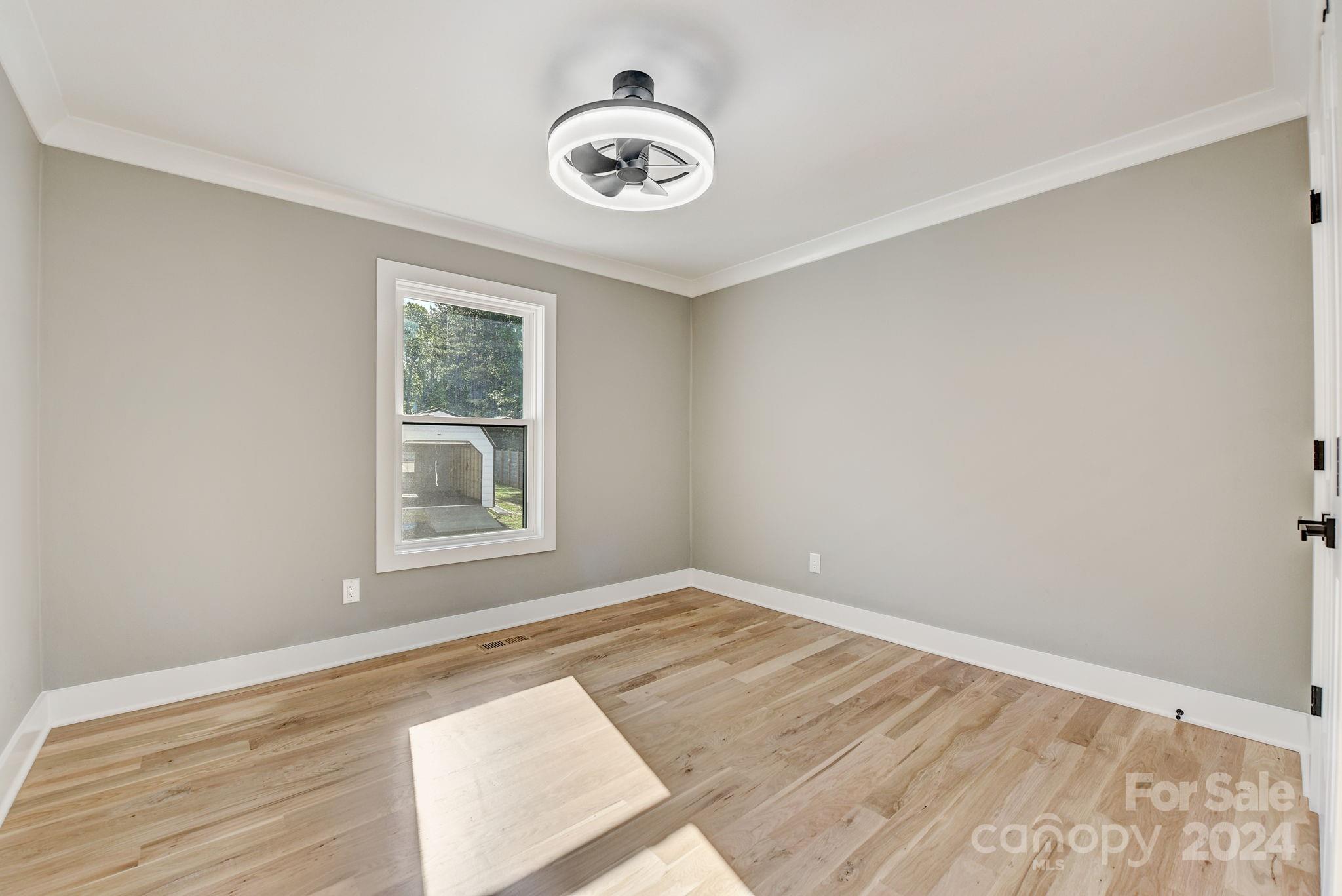 201 Potter Road Monroe, NC 28110 - Photo 27 of 44 an empty room with a window