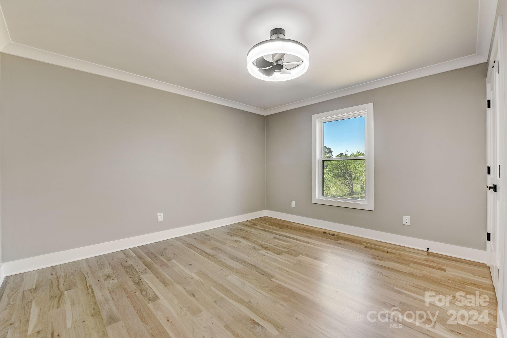 201 Potter Road Monroe, NC 28110 - Photo 29 of 44 an empty room with a window