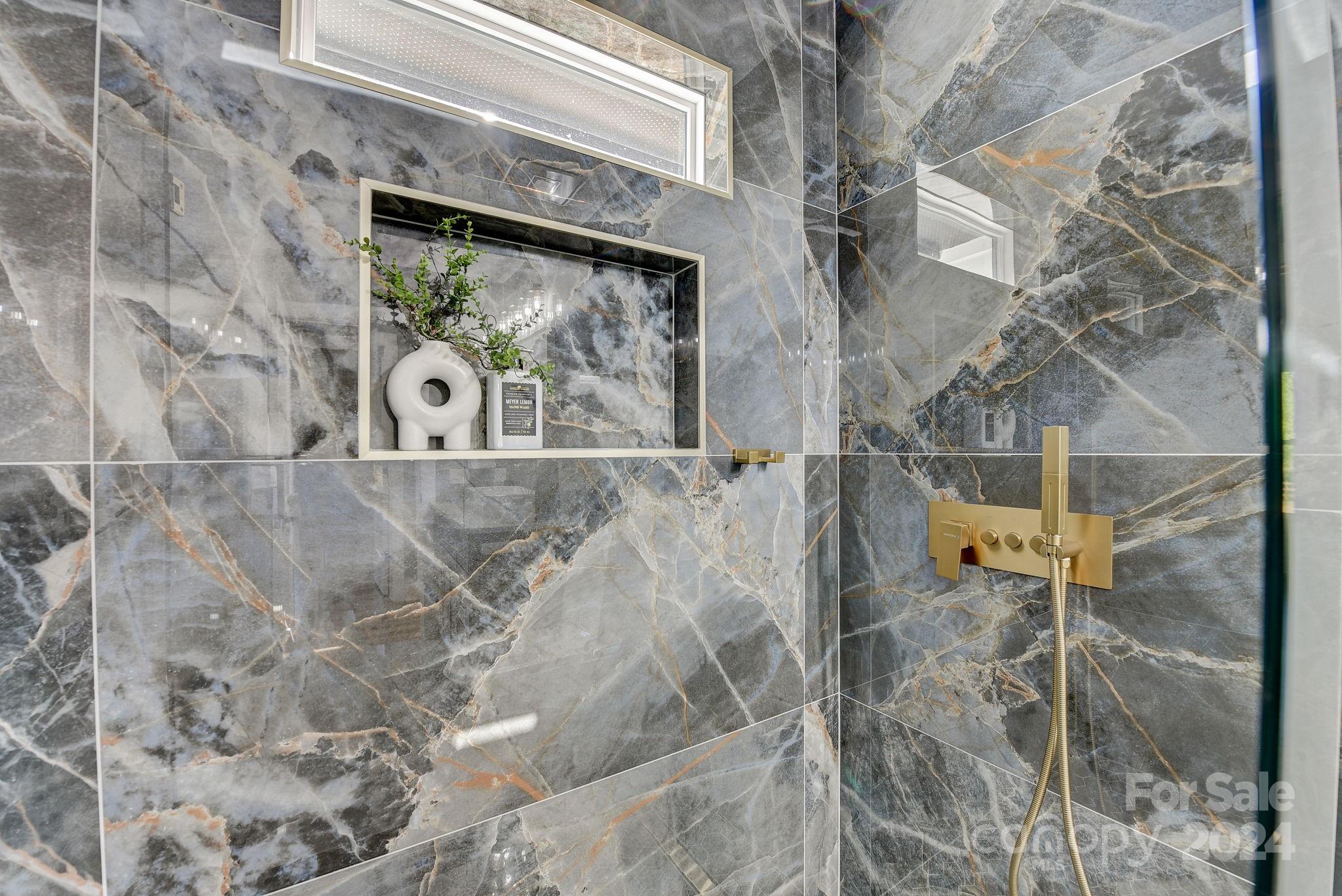 201 Potter Road Monroe, NC 28110 - Photo 31 of 44 a bathroom with a shower