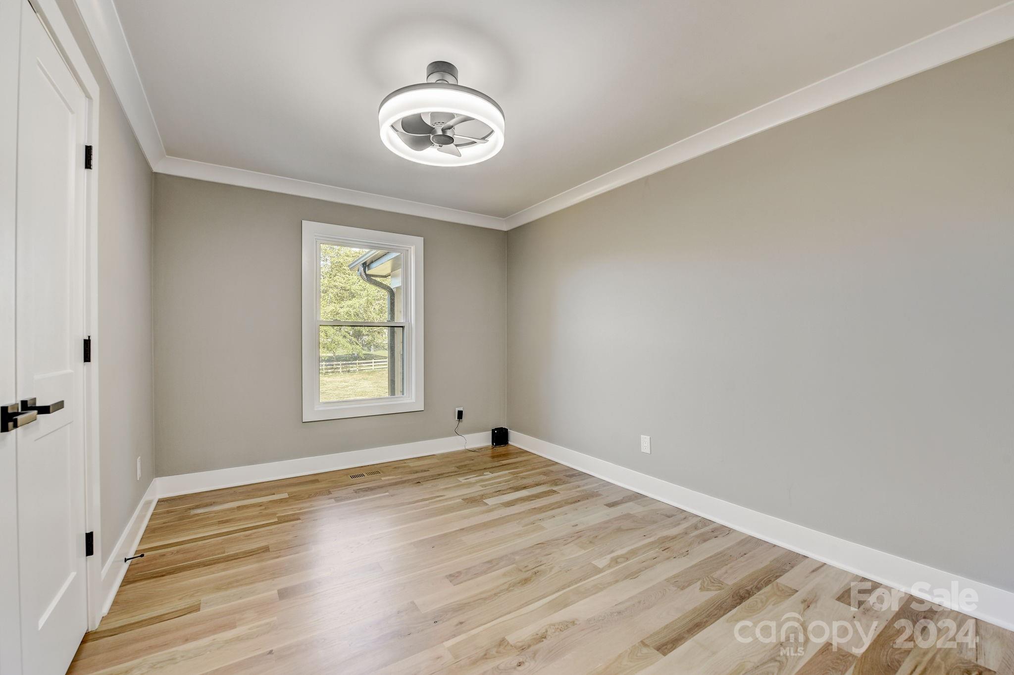 201 Potter Road Monroe, NC 28110 - Photo 32 of 44 an empty room with a window