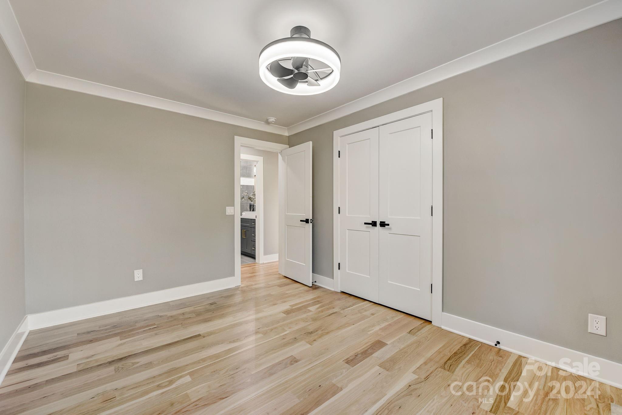 201 Potter Road Monroe, NC 28110 - Photo 33 of 44 a view of an empty room with wooden floor