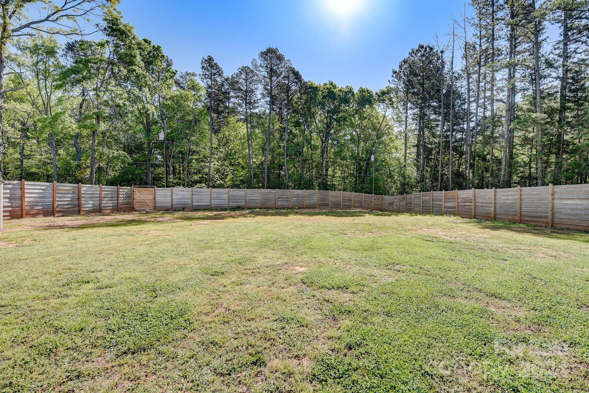 201 Potter Road Monroe, NC 28110 - Photo 38 of 44 a view of a yard