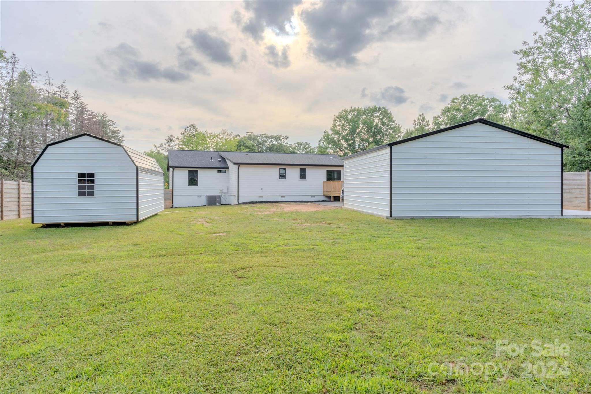 201 Potter Road Monroe, NC 28110 - Photo 39 of 44 a view of a house with a yard
