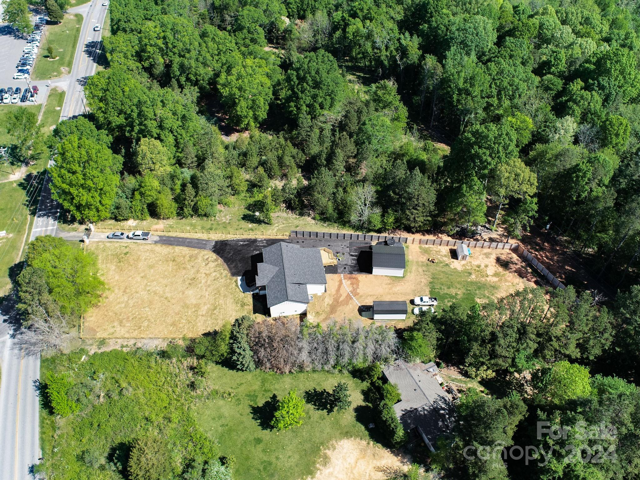 201 Potter Road Monroe, NC 28110 - Photo 42 of 44 an aerial view of a house with yard