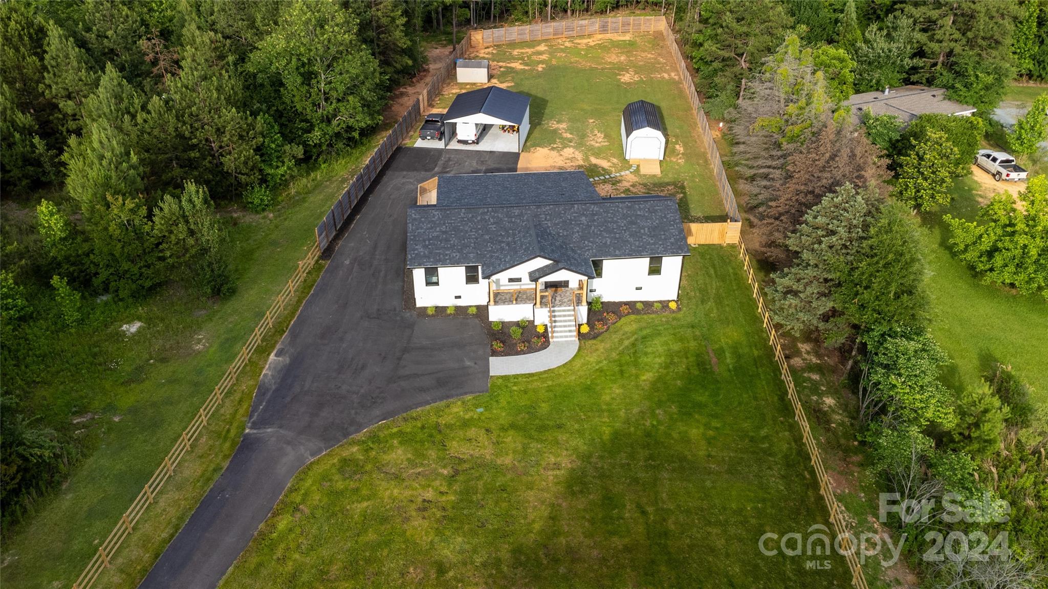 201 Potter Road Monroe, NC 28110 - Photo 44 of 44 a aerial view of a house with a yard
