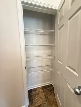 a bathroom with a glass door shower