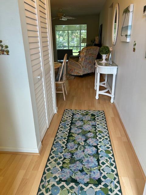 1955 Southwest Palm City Road, Unit H Stuart, FL 34994 - Photo 2 of 22 a bath room with a rug and a rug