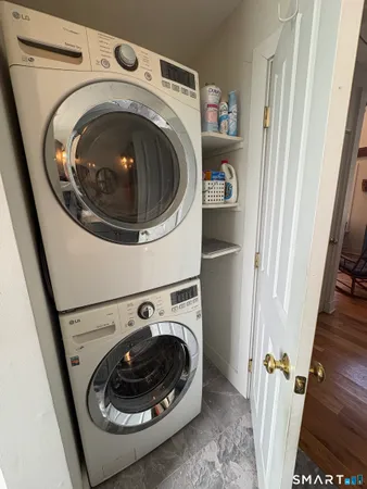 a utility room with dryer and washer