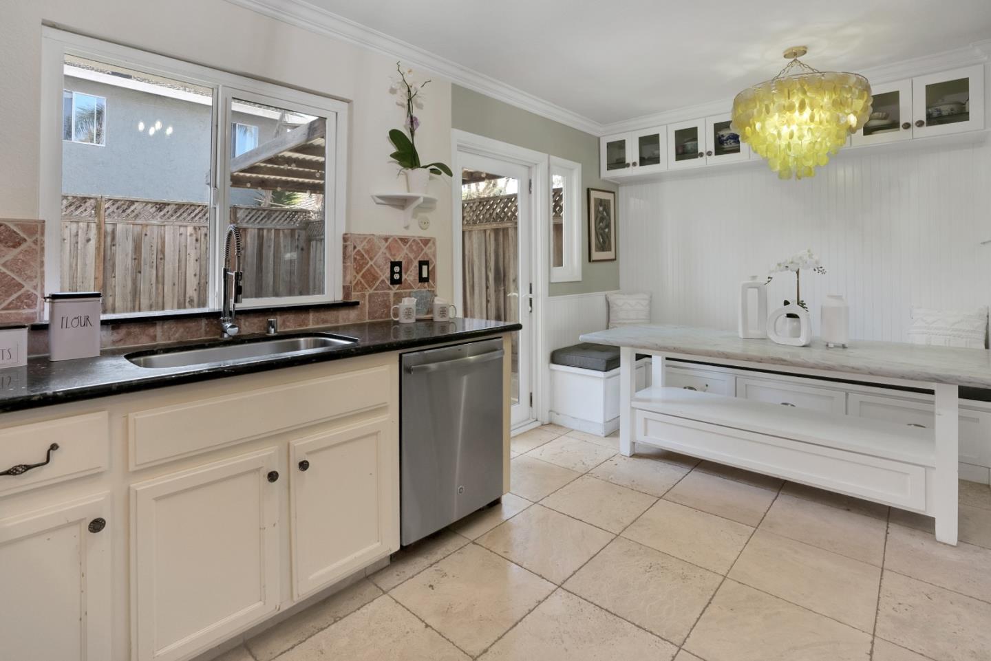 294 Bonefish Court Aptos, CA 95003 - Photo 13 of 27 a kitchen with a sink and cabinets