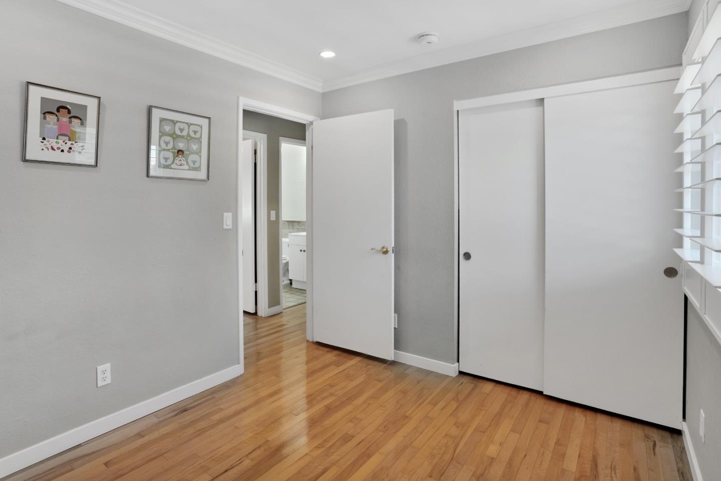 294 Bonefish Court Aptos, CA 95003 - Photo 20 of 27 a view of an empty room with wooden floor