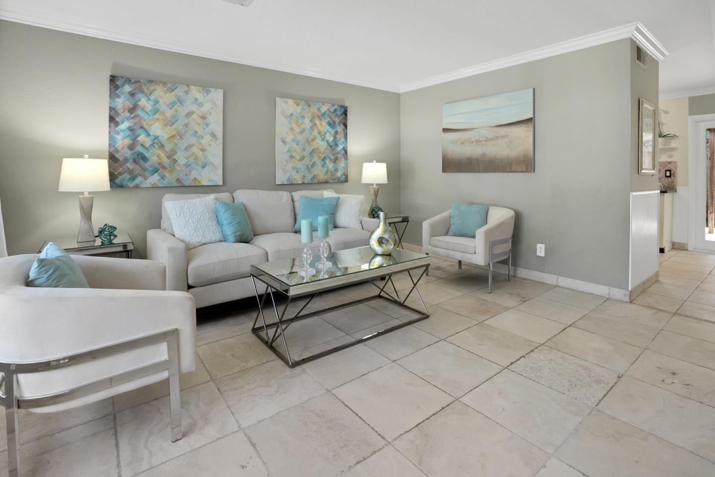 294 Bonefish Court Aptos, CA 95003 - Photo 5 of 27 a living room with furniture and a wall painting