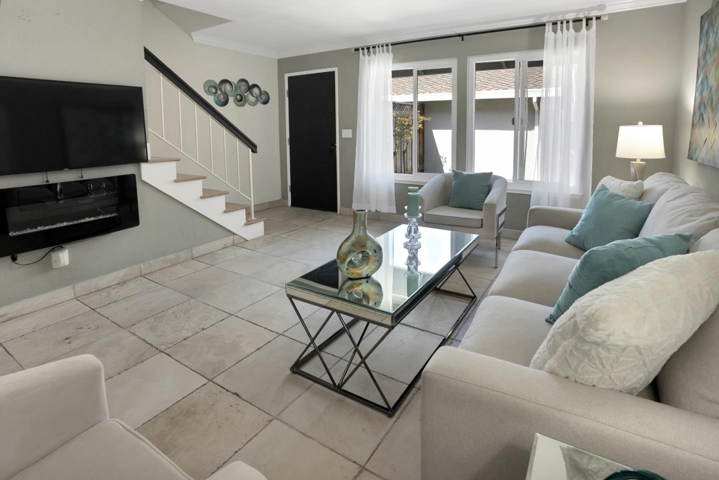 294 Bonefish Court Aptos, CA 95003 - Photo 8 of 27 a living room with furniture and a flat screen tv