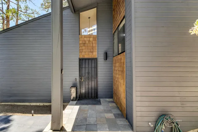 a view of a chairs and tables in the patio