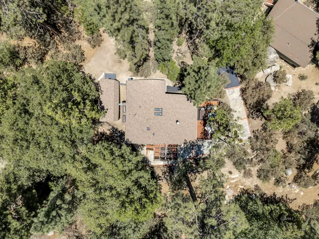 a view of a brick house with windows