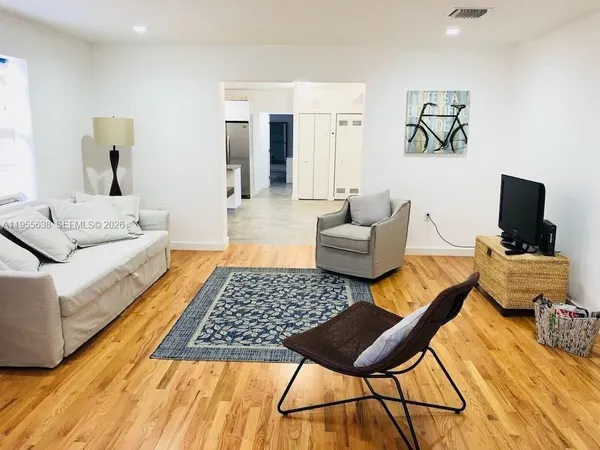 a living room with furniture and a couch