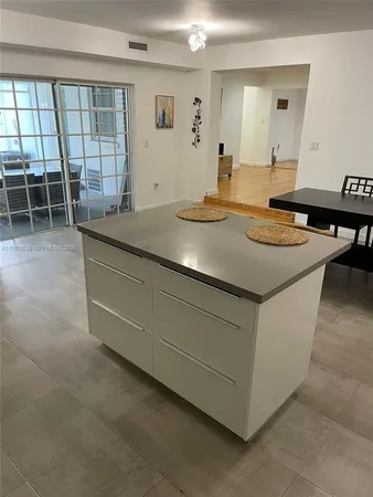 a room with a table and chairs