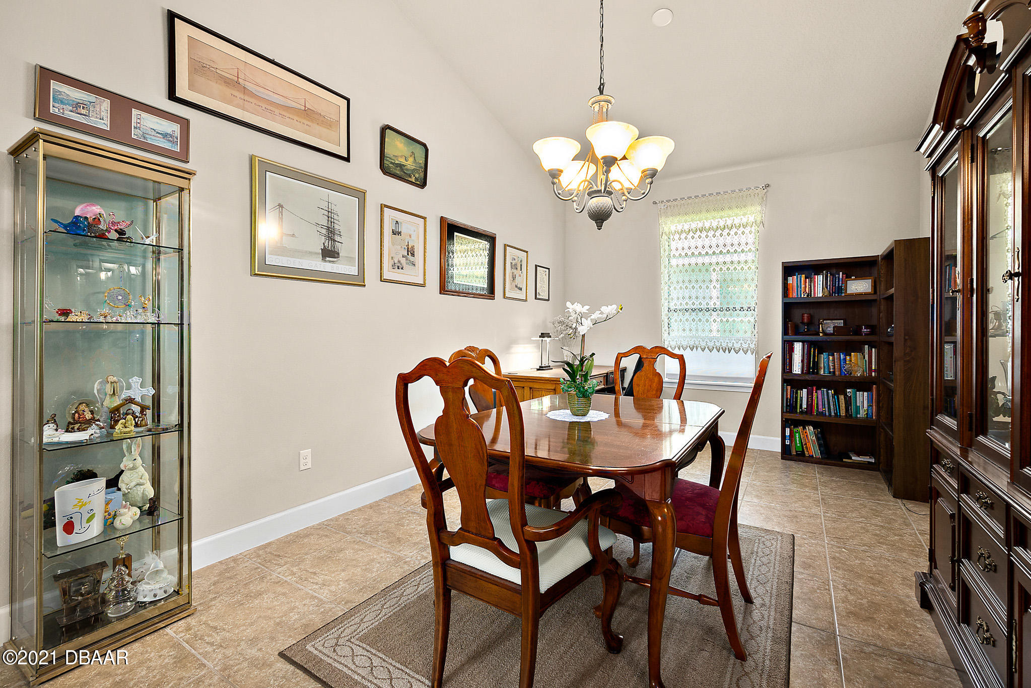 667 Elk River Drive Ormond Beach, FL 32174 - Photo 17 of 49 a view of a dining room with furniture