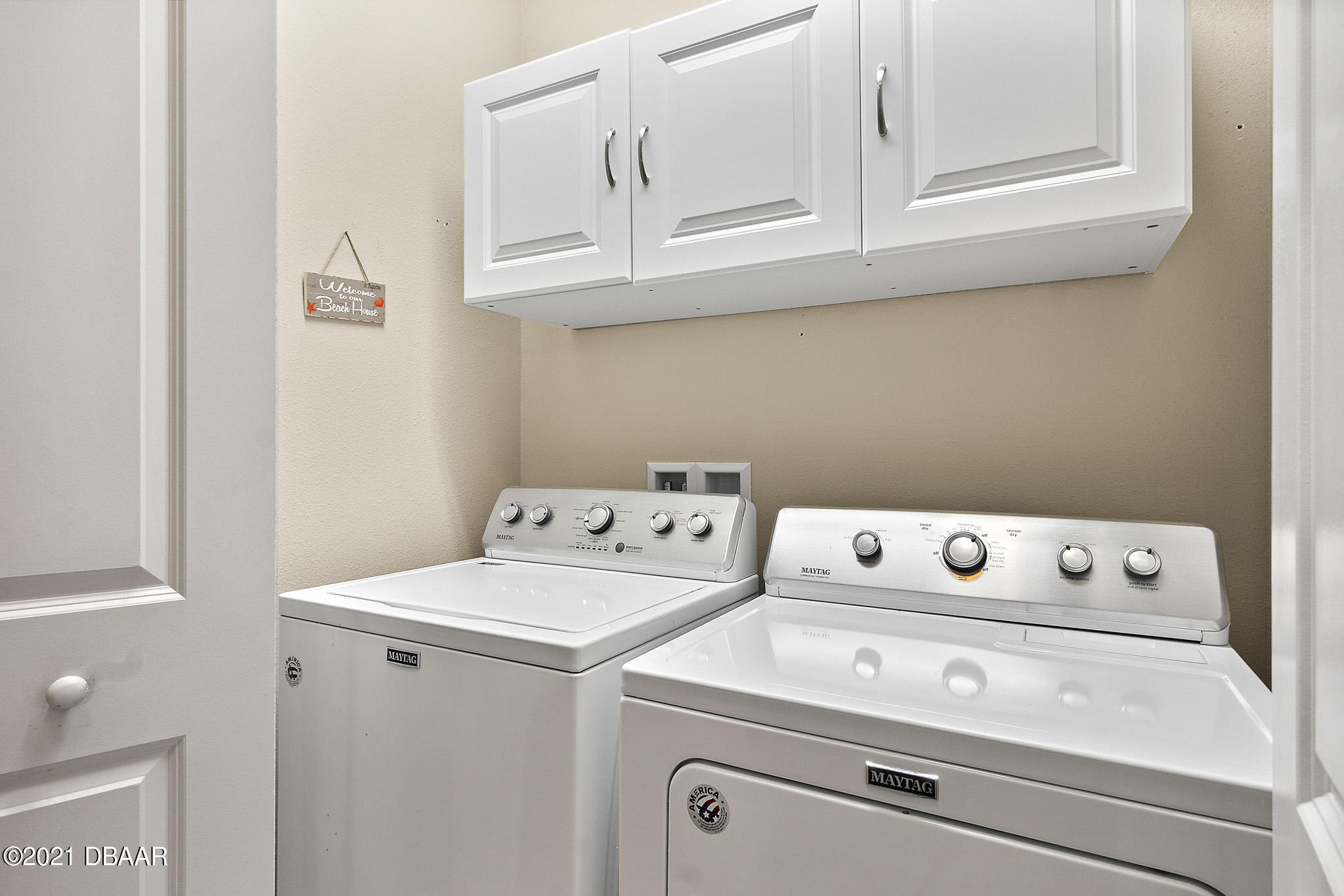 667 Elk River Drive Ormond Beach, FL 32174 - Photo 29 of 49 a utility room with dryer and washer