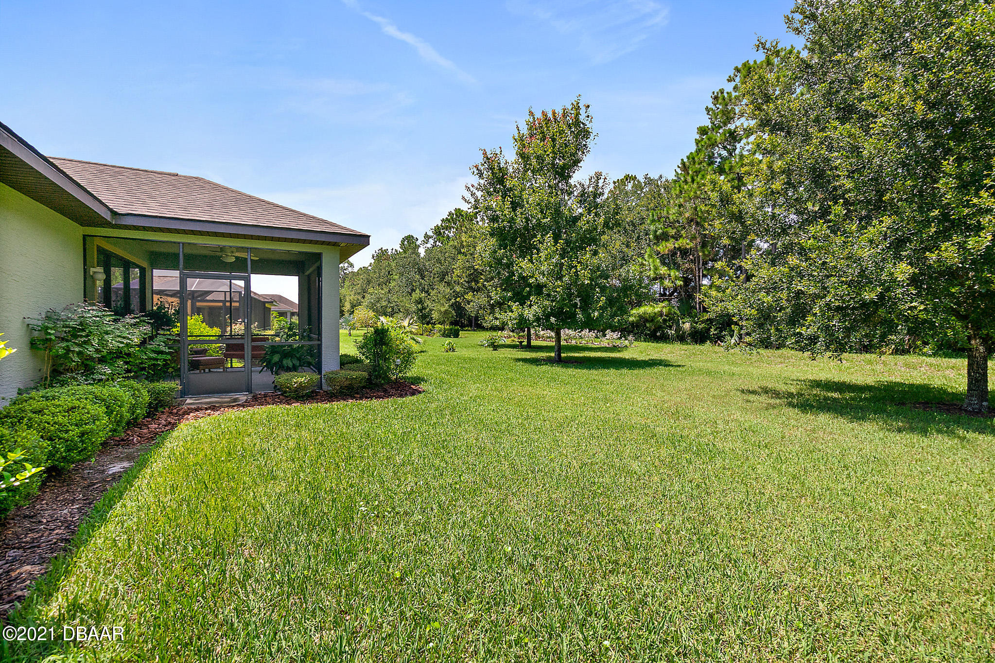 667 Elk River Drive Ormond Beach, FL 32174 - Photo 34 of 49 a view of outdoor space yard and deck