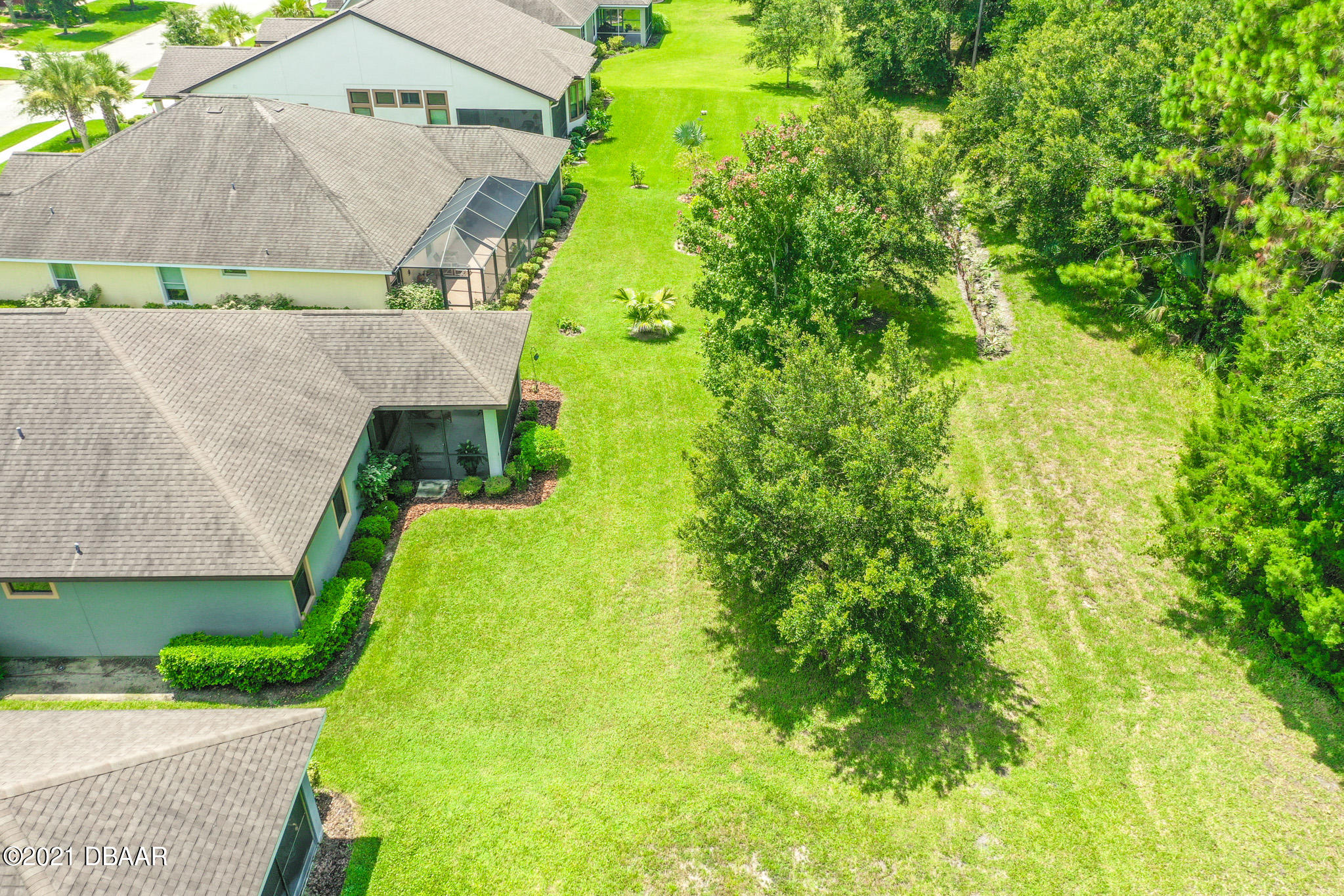 667 Elk River Drive Ormond Beach, FL 32174 - Photo 40 of 49 an aerial view of a house with a yard