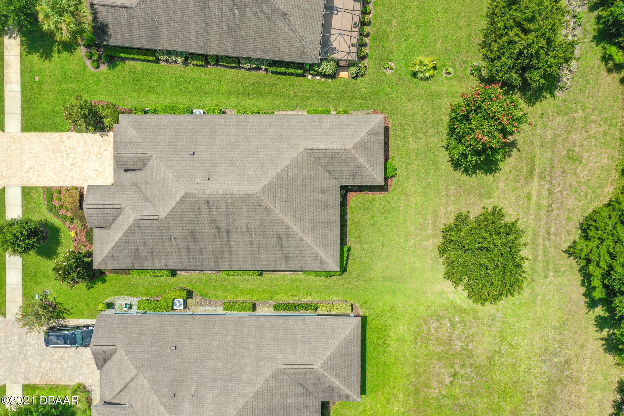 667 Elk River Drive Ormond Beach, FL 32174 - Photo 41 of 49 an aerial view of a house with a garden and a yard