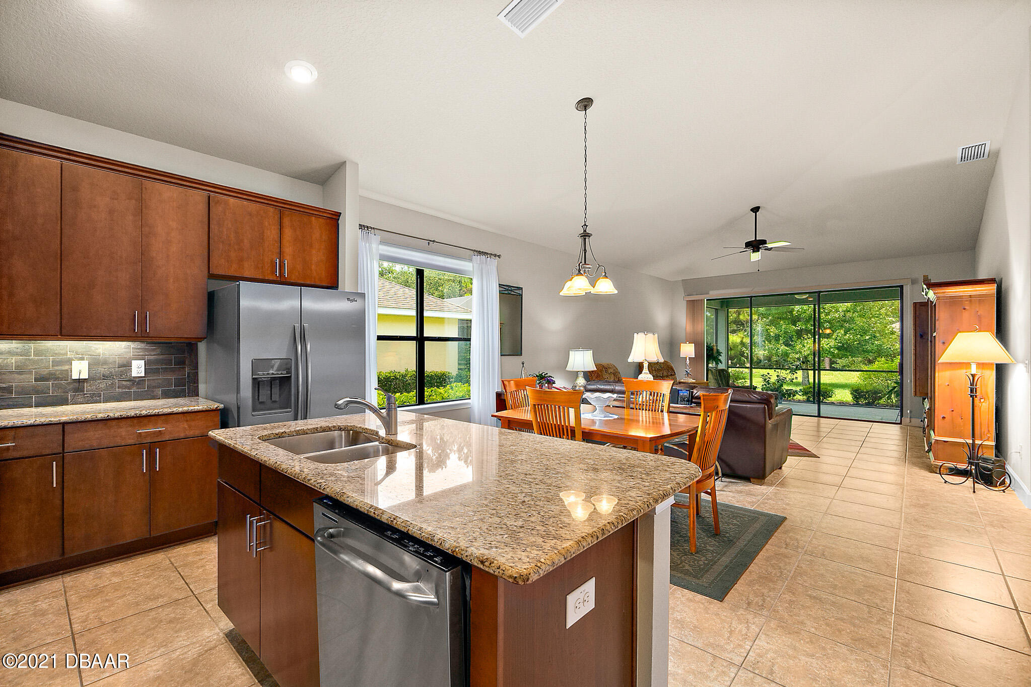 667 Elk River Drive Ormond Beach, FL 32174 - Photo 9 of 49 a kitchen with granite countertop lots of counter top space