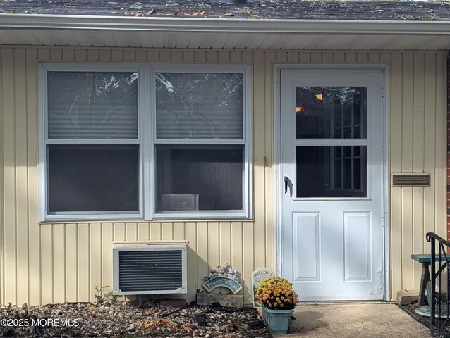 a front view of a house with a windows