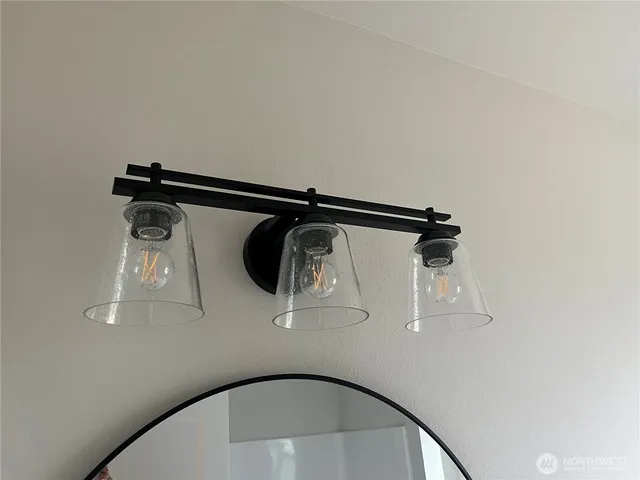 a bathroom with a sink and a window