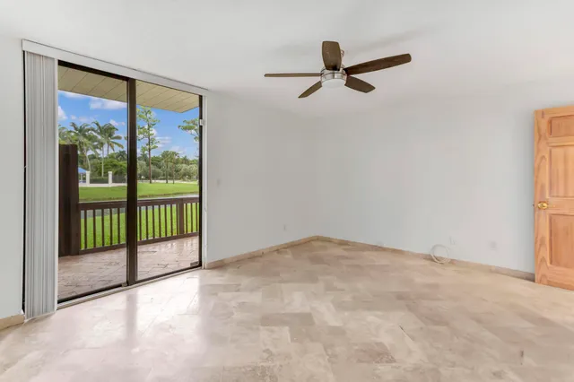 a view of lake with a yard