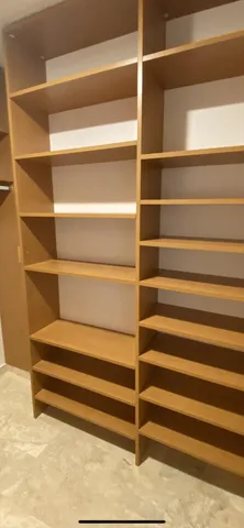 a view of a yard with a fountain and a large tree