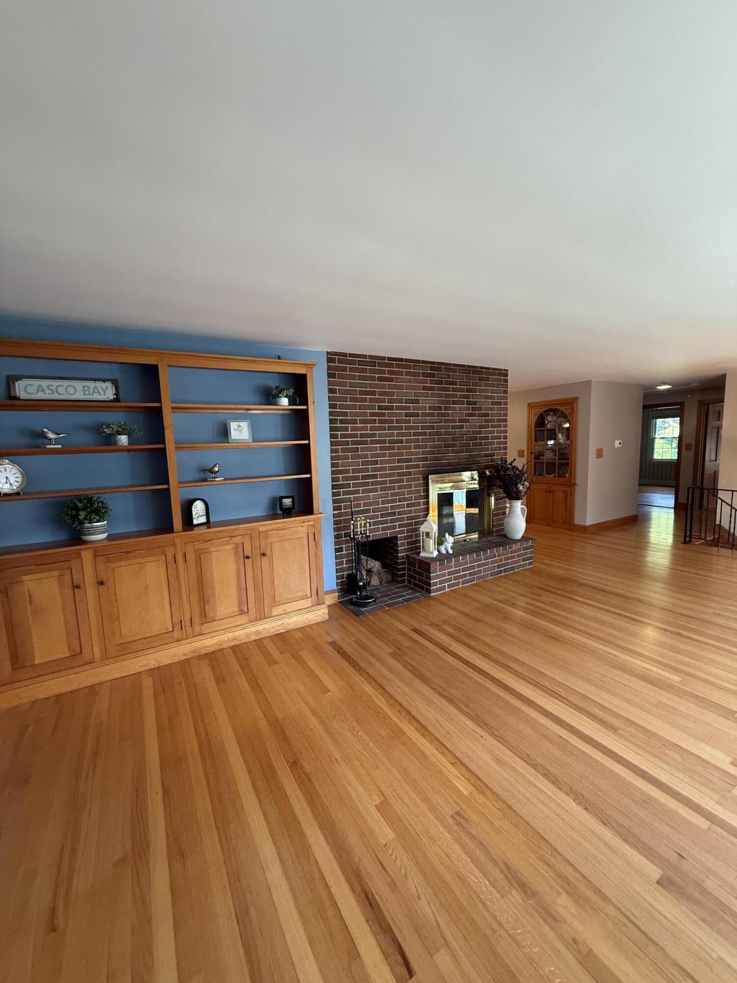 36 Pinewood Drive Cumberland, ME 04021 - Photo 16 of 38 bkslf & fireplace