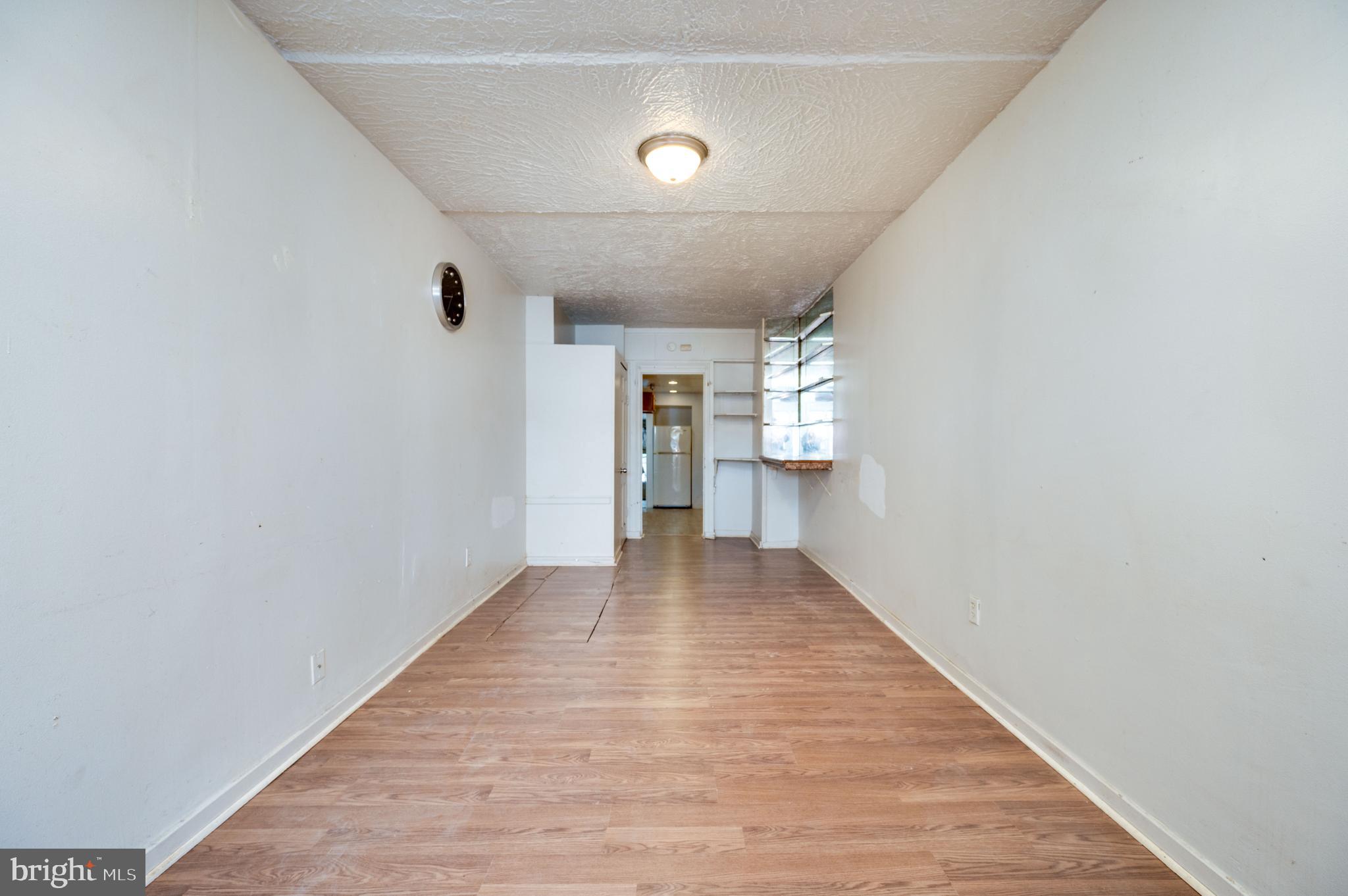 1022 Birch Street Reading, PA 19604 - Photo 12 of 32 a view of an empty room with wooden floor