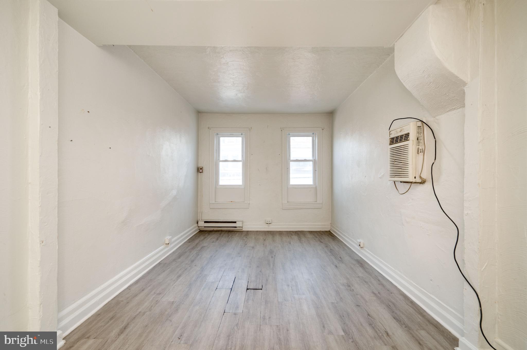 1022 Birch Street Reading, PA 19604 - Photo 24 of 32 a view of empty room with wooden floor and fan