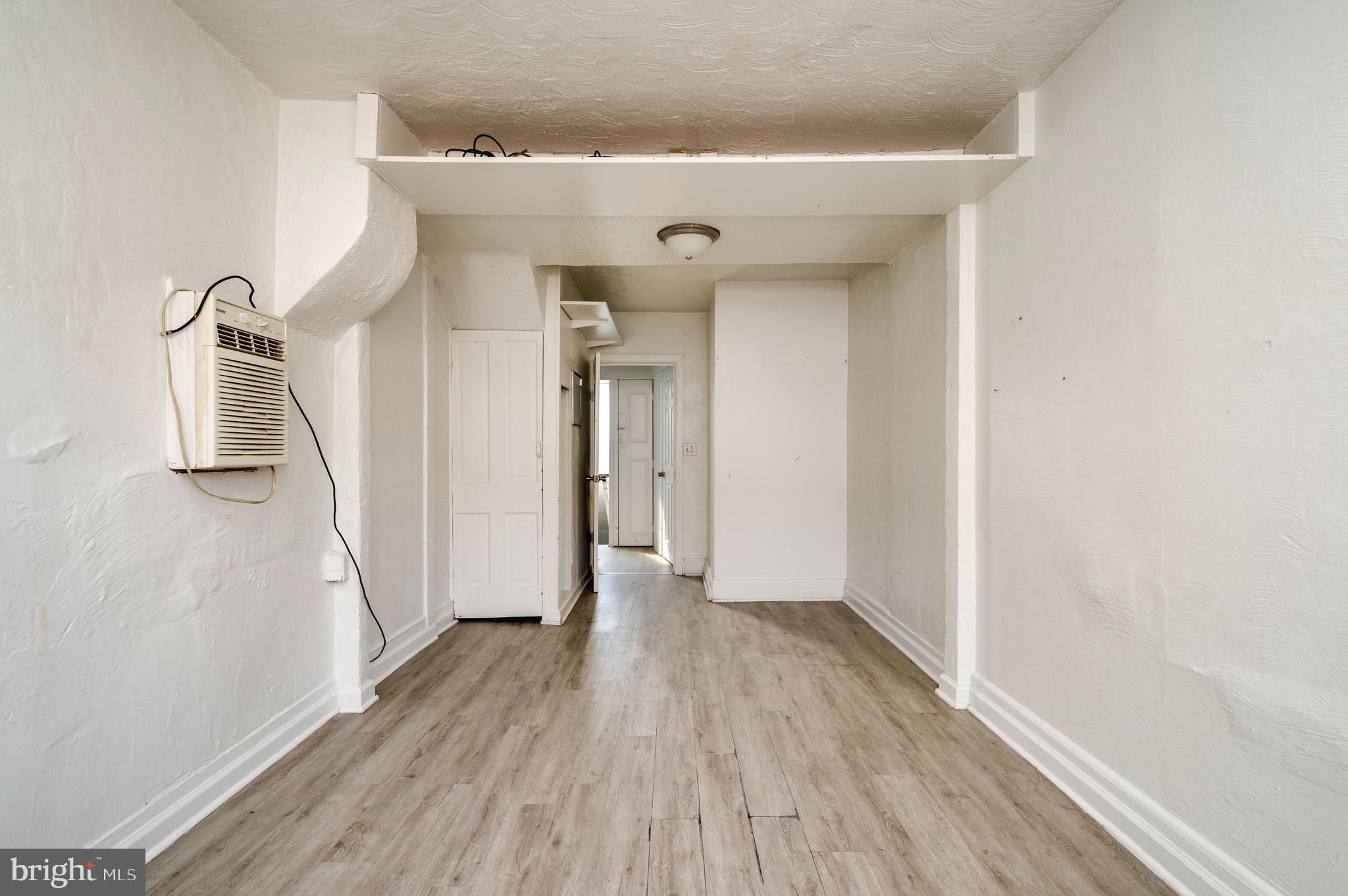 1022 Birch Street Reading, PA 19604 - Photo 25 of 32 a view of a hallway with wooden floor