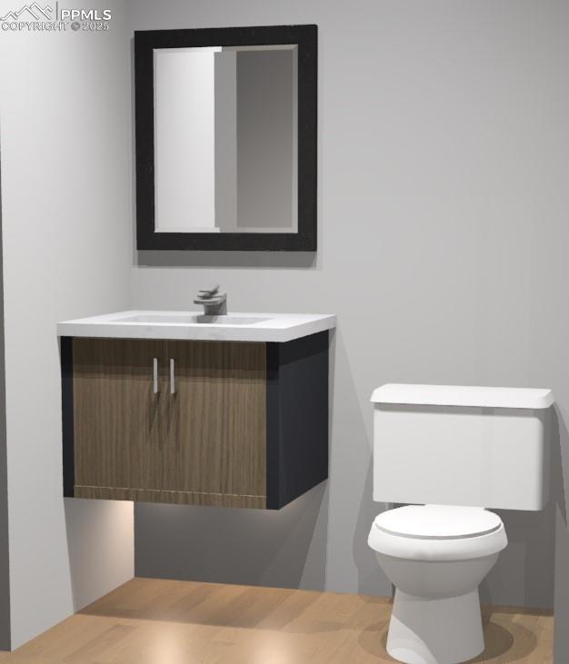 175 Terrace Drive Colorado Springs, CO 80906 - Photo 18 of 50 a bathroom with a toilet sink and mirror