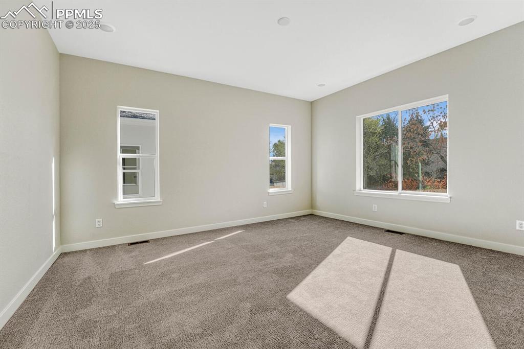 175 Terrace Drive Colorado Springs, CO 80906 - Photo 28 of 50 an empty room with windows