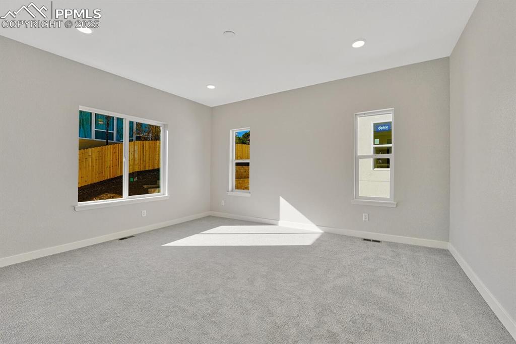 175 Terrace Drive Colorado Springs, CO 80906 - Photo 32 of 50 an empty room with windows