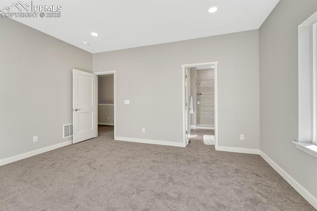 175 Terrace Drive Colorado Springs, CO 80906 - Photo 33 of 50 an empty room with windows and closet