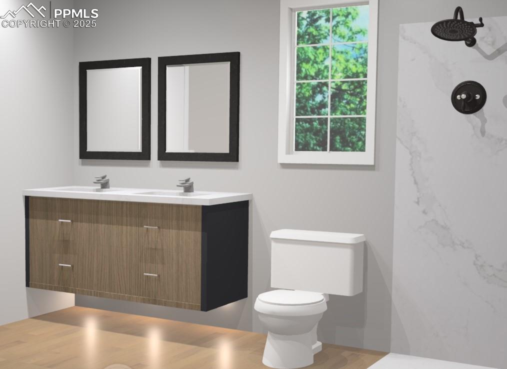 175 Terrace Drive Colorado Springs, CO 80906 - Photo 35 of 50 a bathroom with a sink toilet a mirror and window