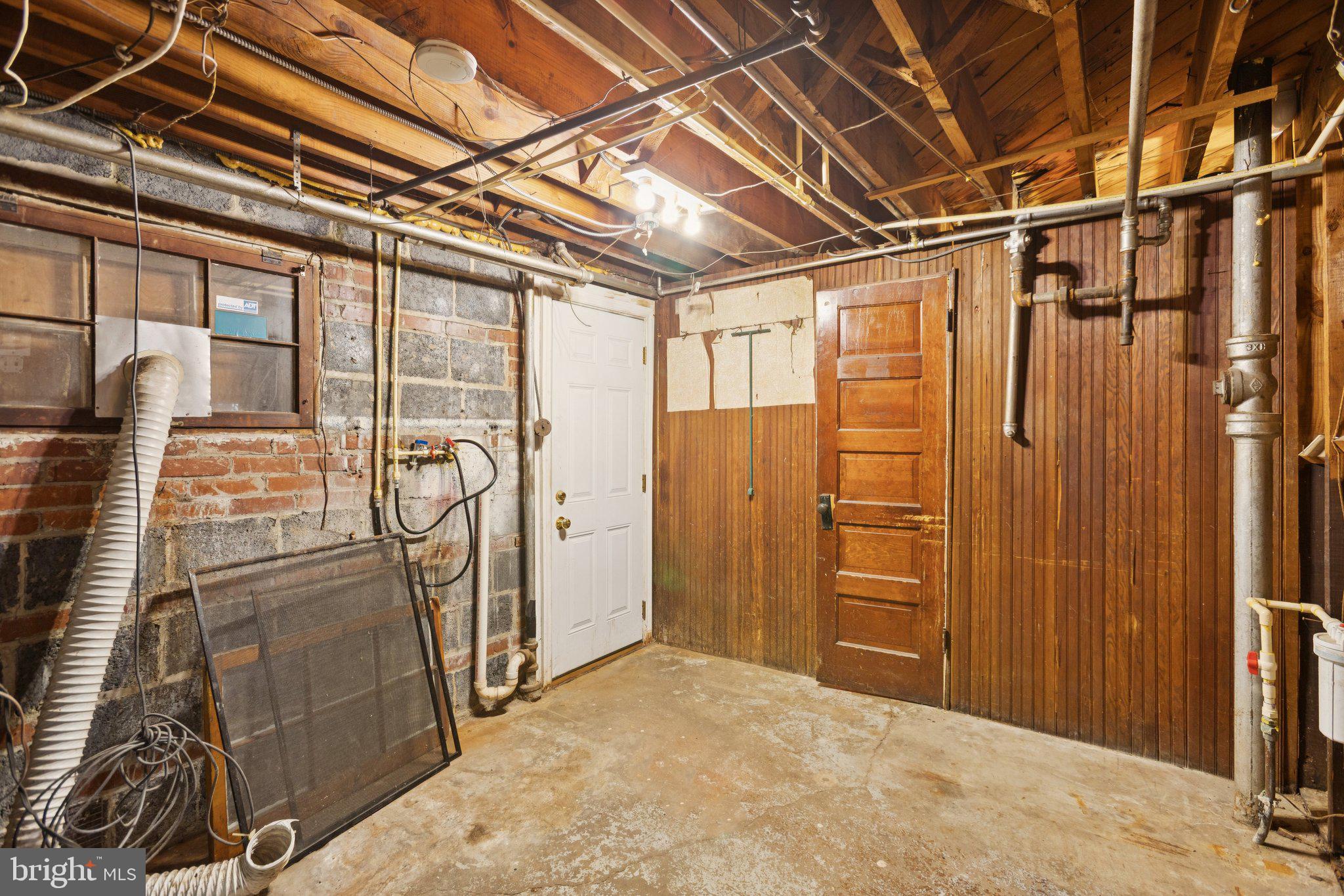 1633 R Street Southeast Washington, DC 20020 - Photo 32 of 44 a view of empty room with wooden walls