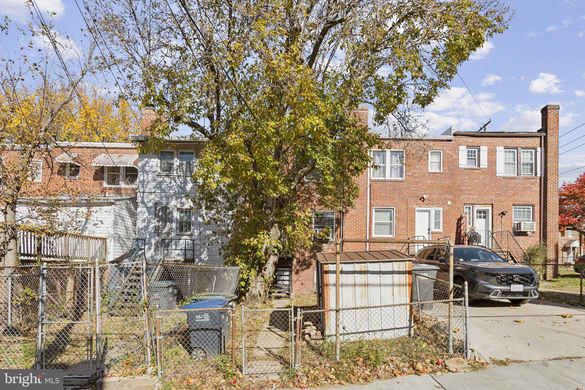 1633 R Street Southeast Washington, DC 20020 - Photo 35 of 44 a front view of a house with a yard