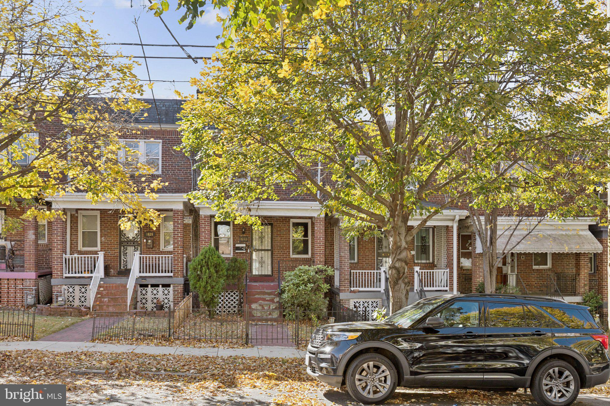 1633 R Street Southeast Washington, DC 20020 - Photo 42 of 44 a front view of a house with parking space