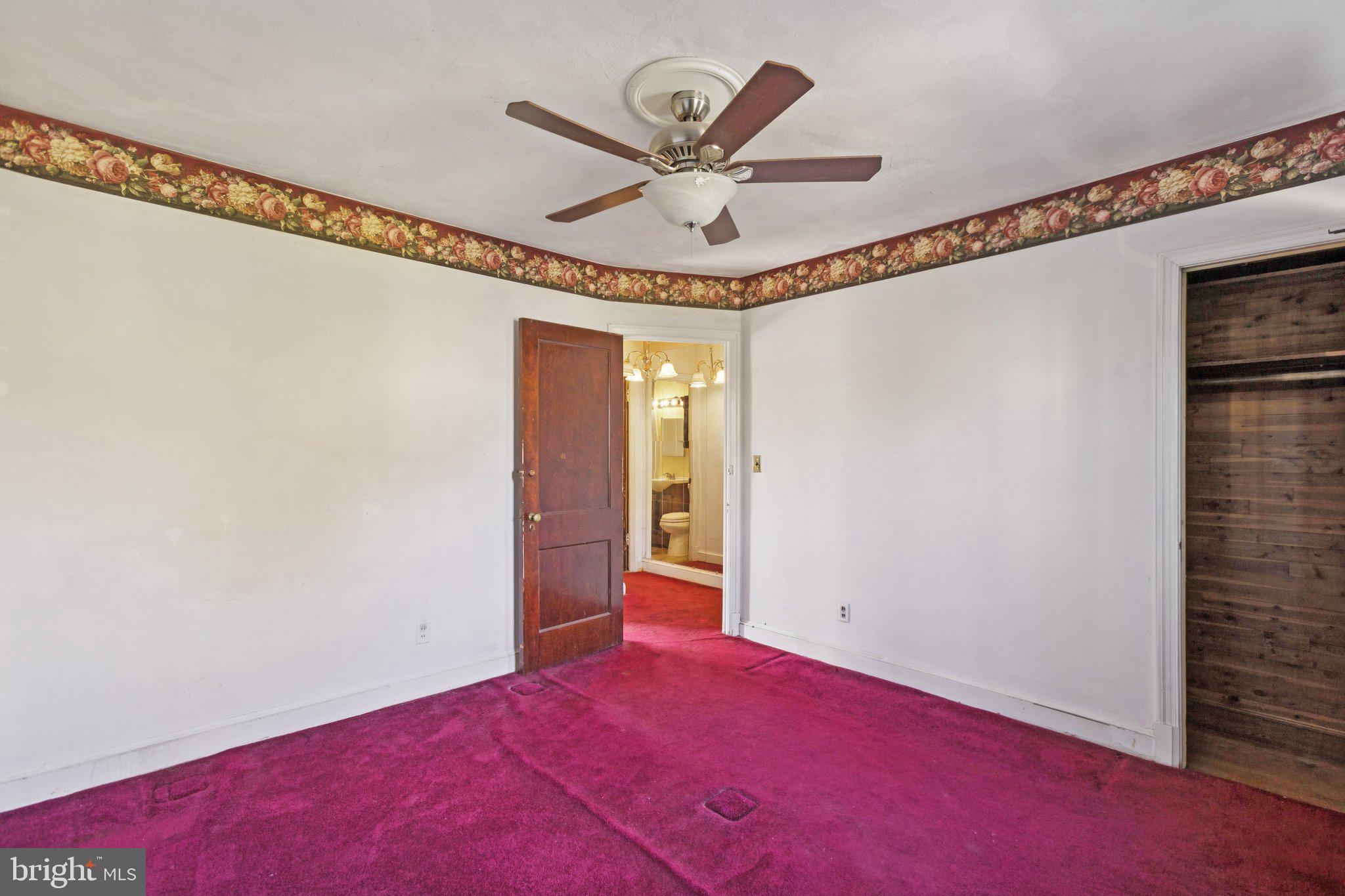 1633 R Street Southeast Washington, DC 20020 - Photo 8 of 44 a view of a hallway with a ceiling fan