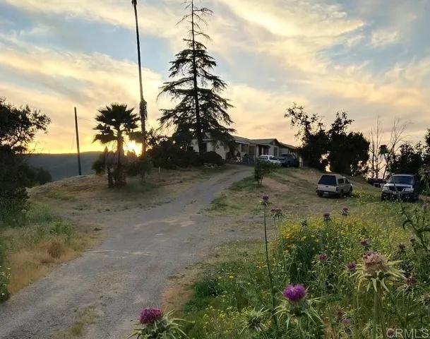 a childrens park with lots of swings and slides