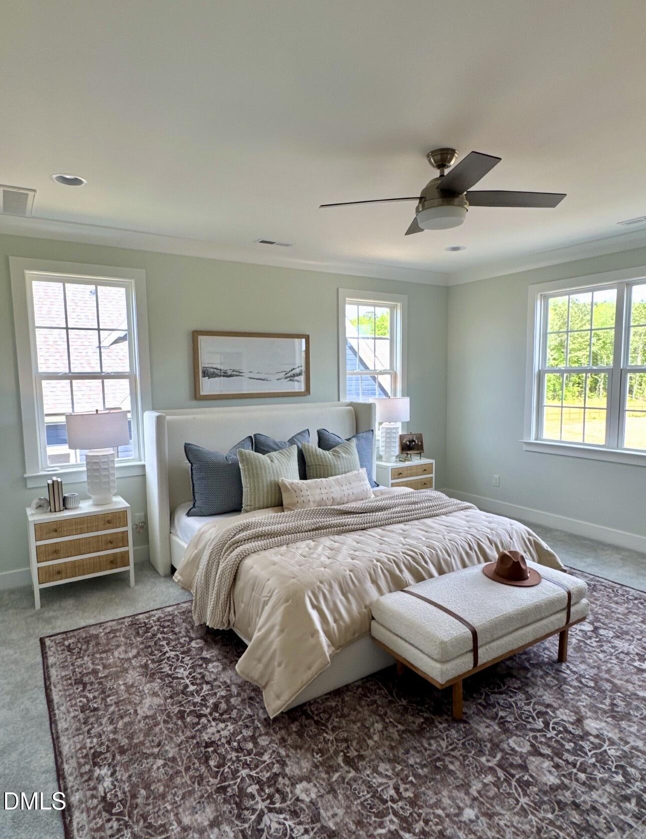 1057 Azalea Garden Circle Raleigh, NC 27603 - Photo 17 of 20 a bedroom with a bed and a window