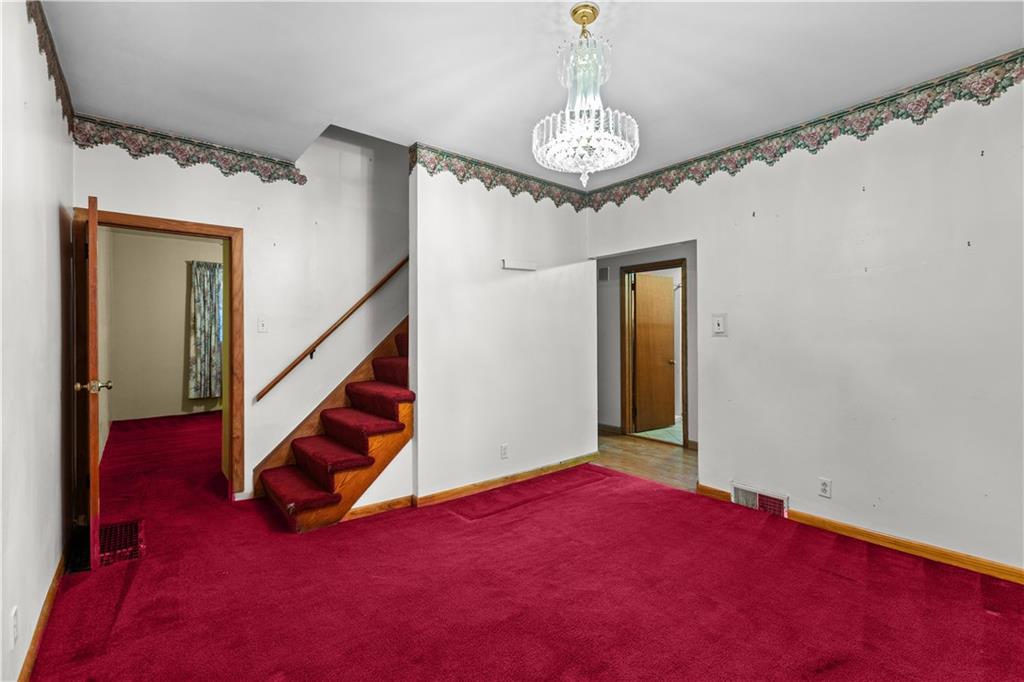 109 Helen Street McKees Rocks, PA 15136 - Photo 14 of 31 a view of empty room with wooden floor