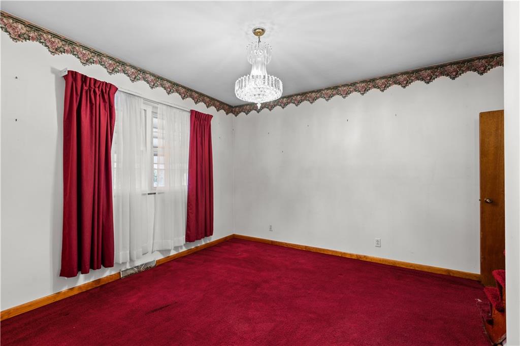 109 Helen Street McKees Rocks, PA 15136 - Photo 15 of 31 a view of a room with window and ceiling fan
